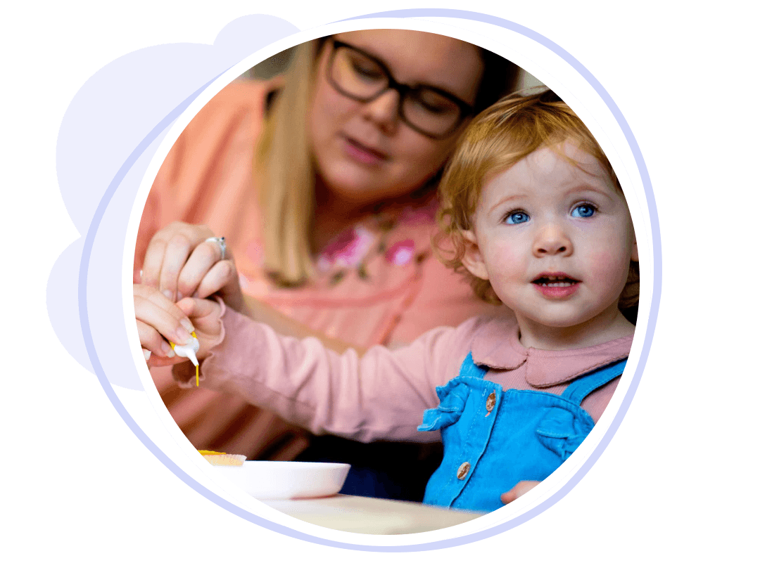 Childminder and child paintings