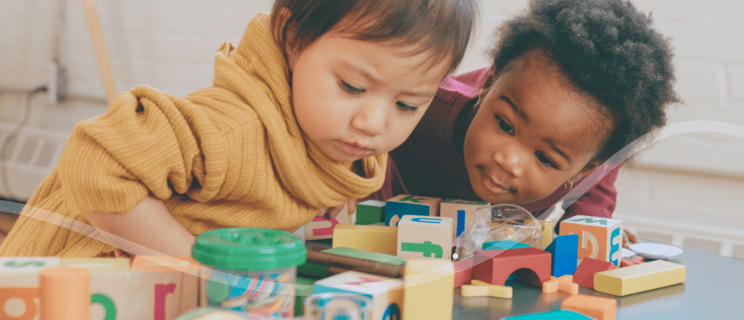 Two children playing with toys